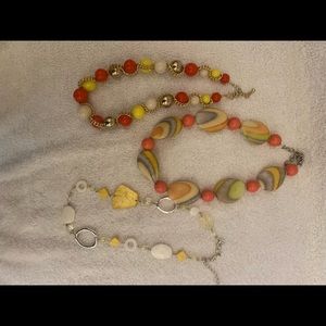 Trio of fun necklaces in acrylic in reds, yellows